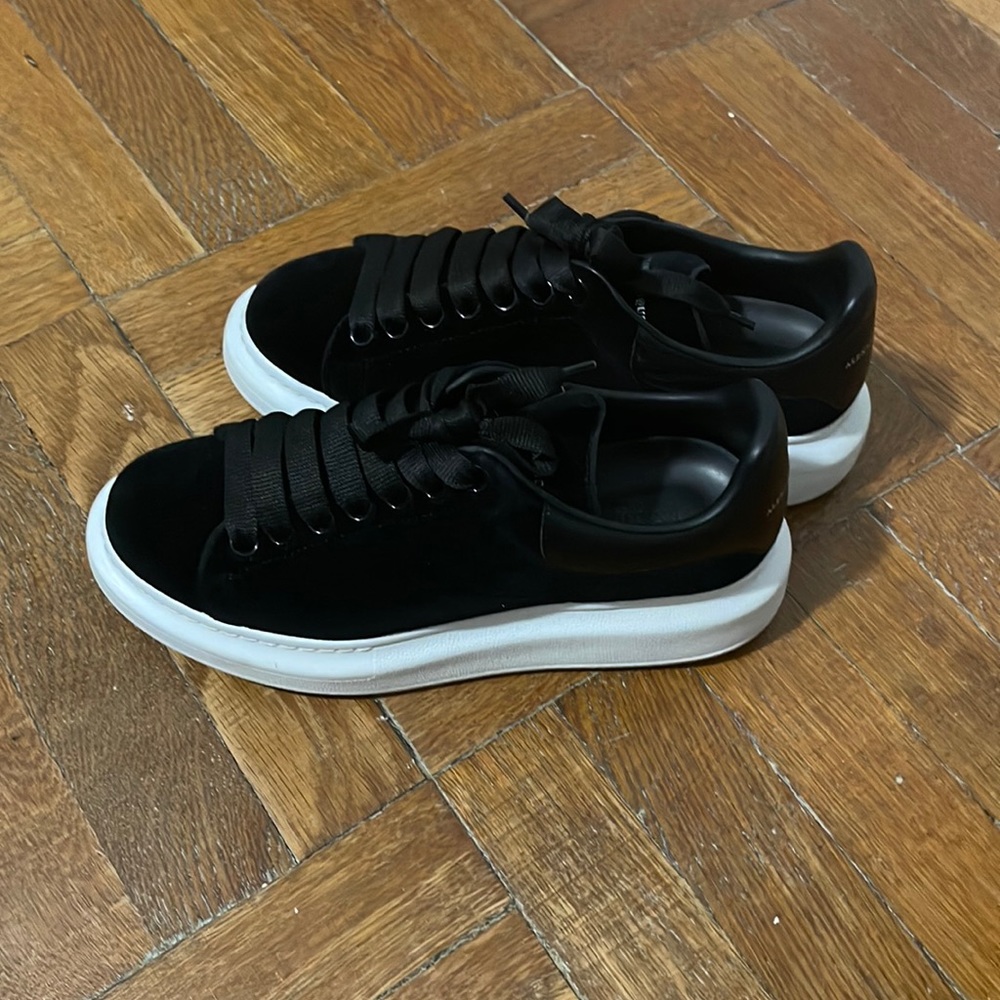 Alexander McQueen black suede with white bottom sneakers